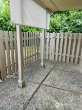Patio surrounded by greenery & new shade