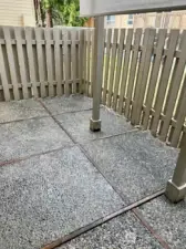 Patio surrounded by greenery & new shade