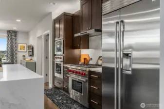 Sub Zero fridge and Wolf range plus a second Kitchen Aid oven