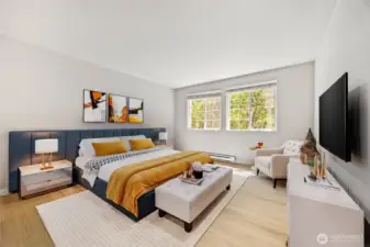 Primary bedroom with new flooring underfoot and fresh interior paint. Lots of room for even a King Sized bed.