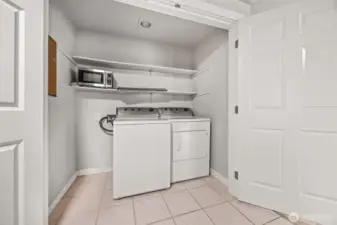 Laundry is tucked just off the kitchen—super convenient