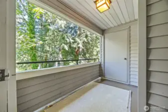Private outside deck with storage closet.
