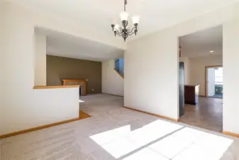 Formal dining looking back to living area on left & kitchen on right
