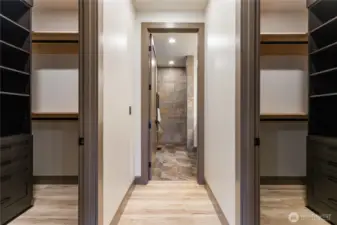 His/Her closets leading to primary bathroom