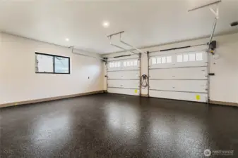 Oversized double car, epoxy coated, EV charging garage