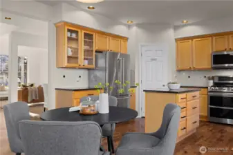 There is a large walk-in pantry in the corner of the kitchen.