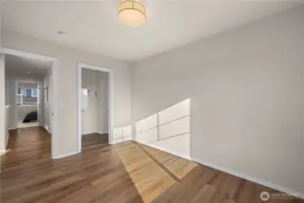 Upper level bedroom 5 of 5 has LVP flooring. Perfect for crafting, yoga, gym or bedroom!