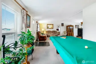 Lots of room in the family room for a second gathering space or playing pool!