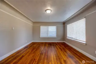 Living room with refinished hardwoos