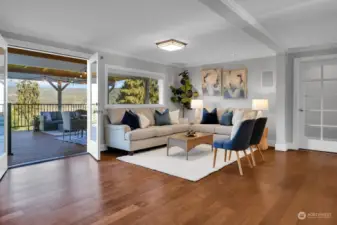 The living area with French door access to the outdoor spaces