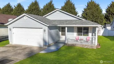 Two car attached garage plus driveway parking.