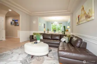 Living Room with Archway to Foyer.
