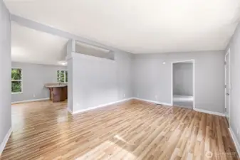 Living area & door to primary bedroom