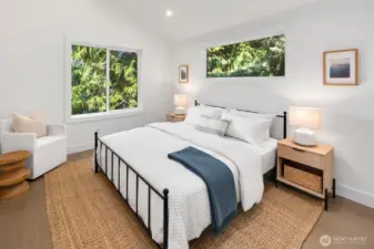 Vaulted ceilings in the upper level primary suite.