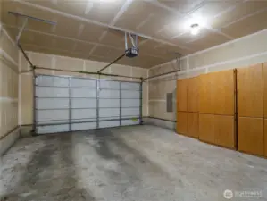 The garage is a great size and has storage cabinets that keeps the space organized.