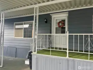 Deck off front door.