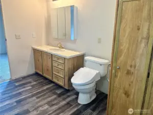Looking back at primary bathroom