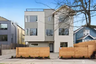 Home is street facing with a fully fenced and level front yard.