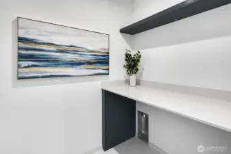 Laundry room with folding table.