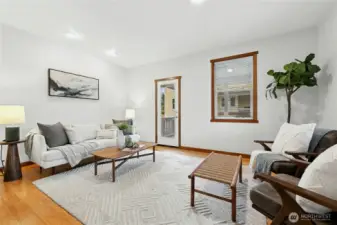 Main level living room with deck access