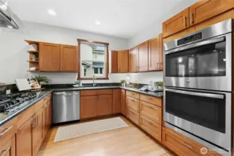 Light-filled kitchen with stainless steel appliances