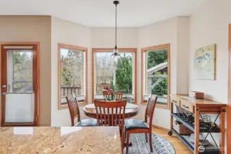 Sunny breakfast area overlooking the backyard.