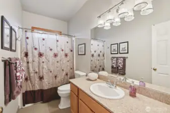 Hall bathroom serving the guest bedrooms.