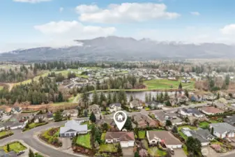 Aerial view, with Otter Pond behind and gorgeous view of the mountains.