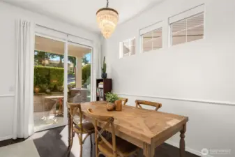 Spacious dining room with slider to the patio.