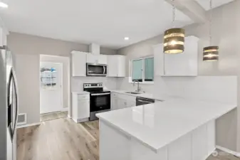 Completely new and remodeled kitchen with stainless steel appliances.