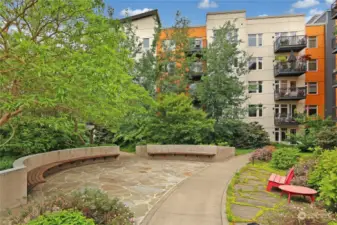 Community patio w/lush gardens