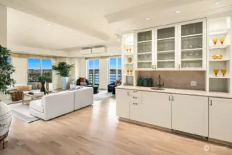 Entertain in style with your butler's pantry, featuring marble countertops, a sink, and expansive storage.