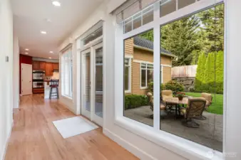 Refinished hardwoods lead to the main floor bedroom or office, and 3/4 bath.