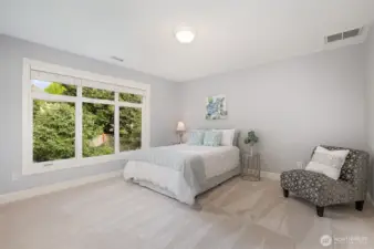 Generously sized guest bedroom 1.