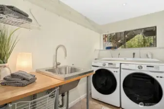 Downstairs laundry room contains a sink - handy for cleaning up quick!