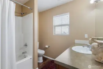 Main bathroom upstairs with a bath tub for your convenience.  Toilet has been upgraded to high boy