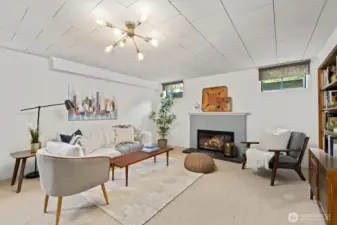Downstairs carpeted cozy rec room.