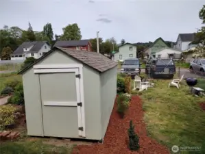 Rear yard triplex with shed