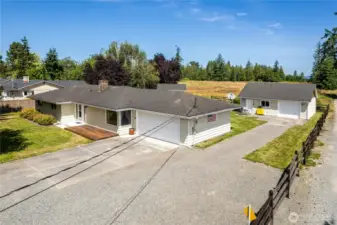 Tons of parking for RV'S, extra vehicles, boats or toys. Flat lot that is a shy 1/2 acre!