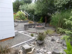 Not so hard to imagine enjoying a spot like this!  Here we are at the east end of the property on the secluded lower level.  Here you see part of the 8 x 12 custom built shed.