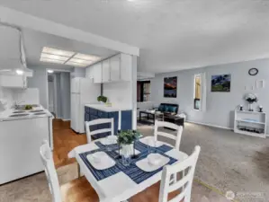 Convenient pass-through kitchen off the dining room with new dishwasher and garbage disposal.