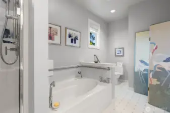 Shower and deep tub with tucked away toilet
