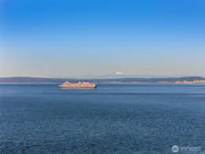The shipping lanes always bring something interesting to look at.  Mt. Baker with the Cascades is impressive in background too-  all heavily snowcapped in winter