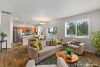 Spacious living room is open to the dining and kitchen areas for easy living!