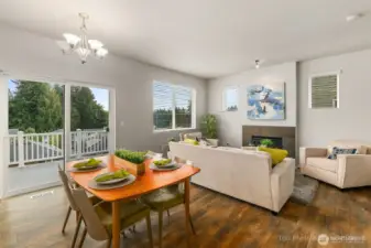 Wall of windows offers great light and an airy feeling. Homes behind this home are at a lower elevation, so it feels private