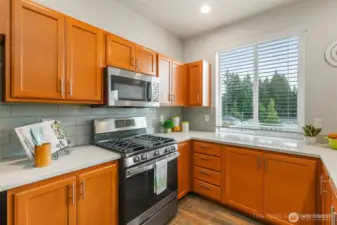 Full height tile backsplash for easy care and a stylish touch