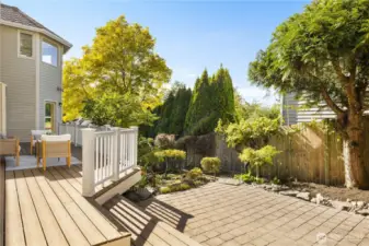 Deck with seating and patio. Garden space for your green thumb.