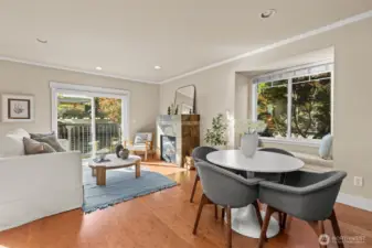 Stylish living and dining area surrounded by greenery