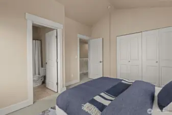 Second bedroom with vaulted ceilings and en suite bathroom
