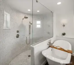 This spa bathroom offers many windows to allow the breeze to flow in.